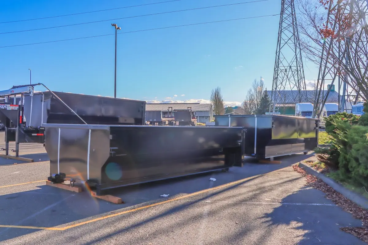 Roll-off dumpster ready for waste disposal at job site for Estate Cleanout Dumpster Rental in Glennville